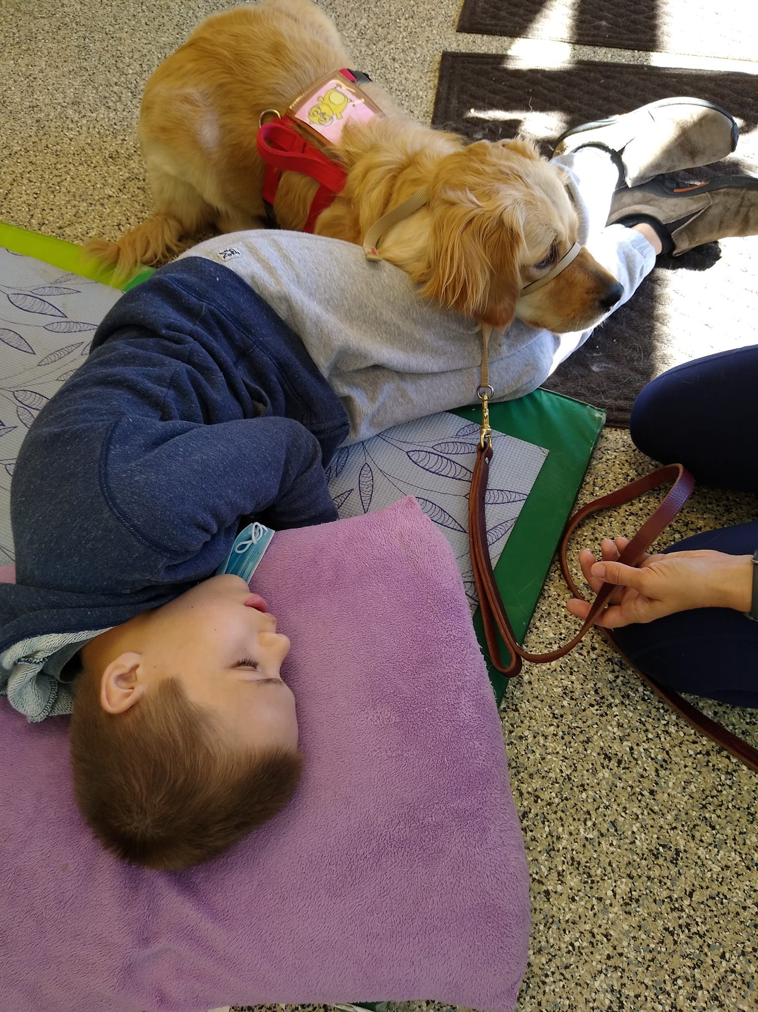 Nurse Jessica Weston and STC Member Lee Luety give the camera a "ta-da" pose after Luety received his Covid-19 vaccine.