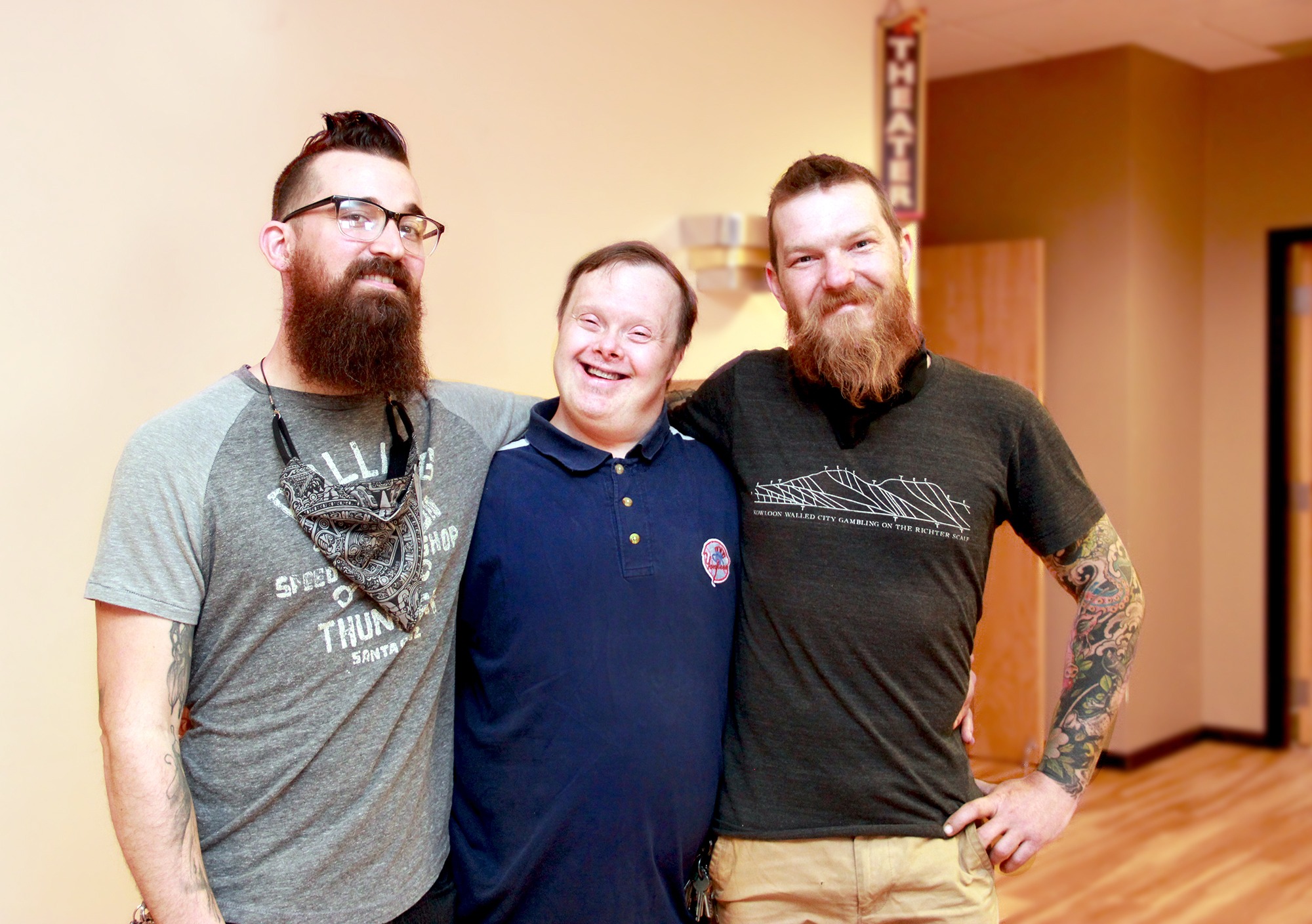 The Foothills Crew (Geoffrey, Jason, and Shane Lobuglio) pose for a group hug