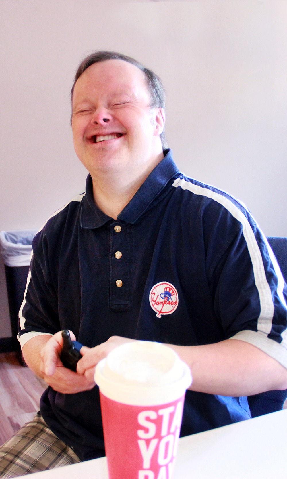 Jason has a good chuckle after hearing a joke.