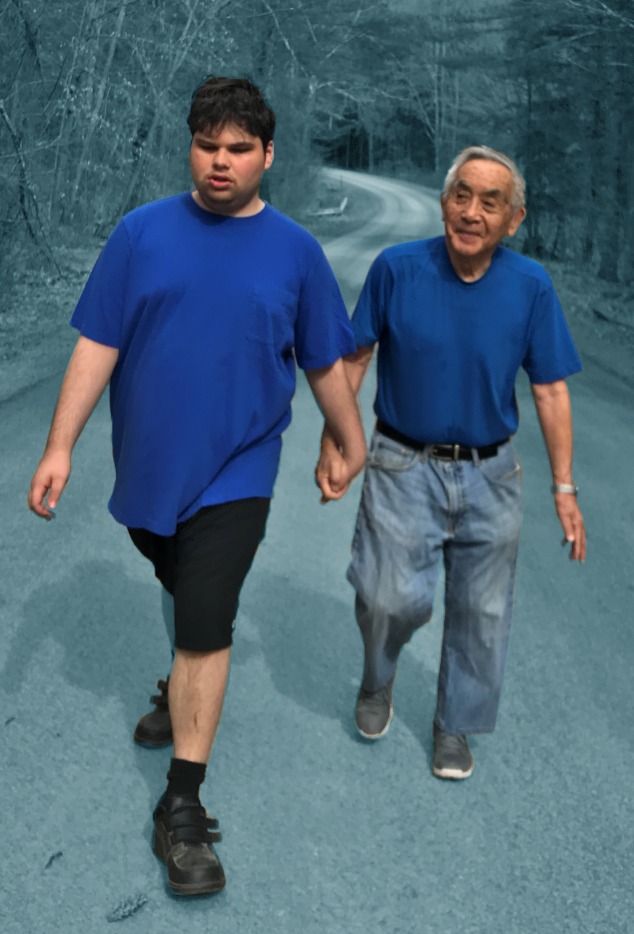 Max Handelman walks down a country road holding his grandfather's hand.