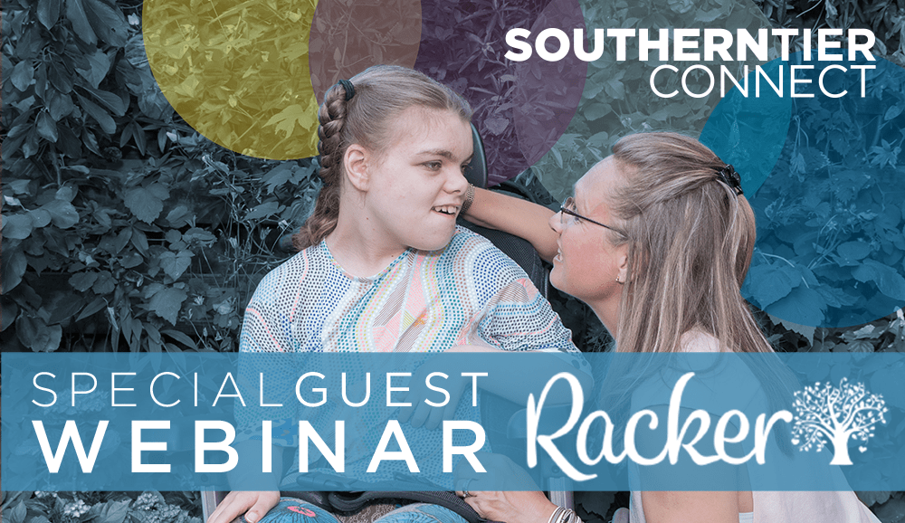 A woman sits beside and looks upwards at a child with a developmental disability